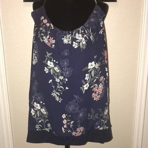 Maurice’s blue tank top